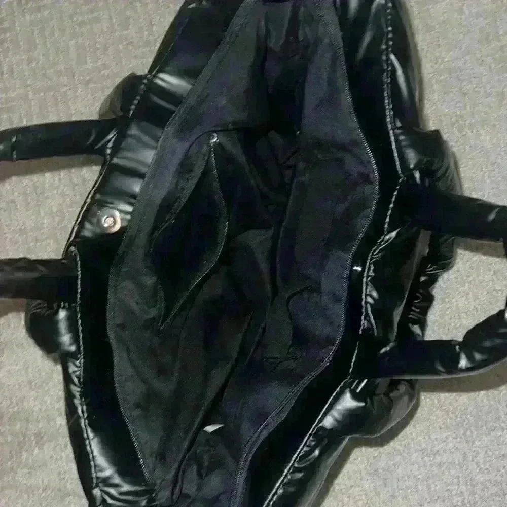 Black puffer quilted travel tote